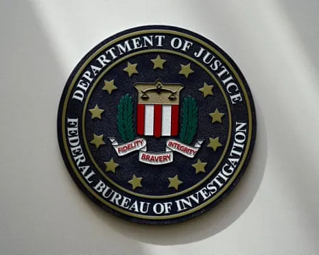 Suspect Sought After Vehicle Crashed into Federal Bureau of Investigation Entrance in Possible Incident of Violence’
